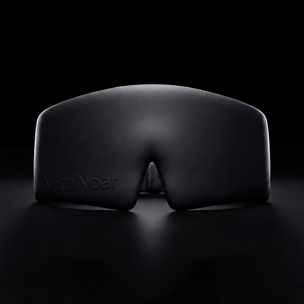 The Sleep Mask showing its smooth front surface and shaped nose area