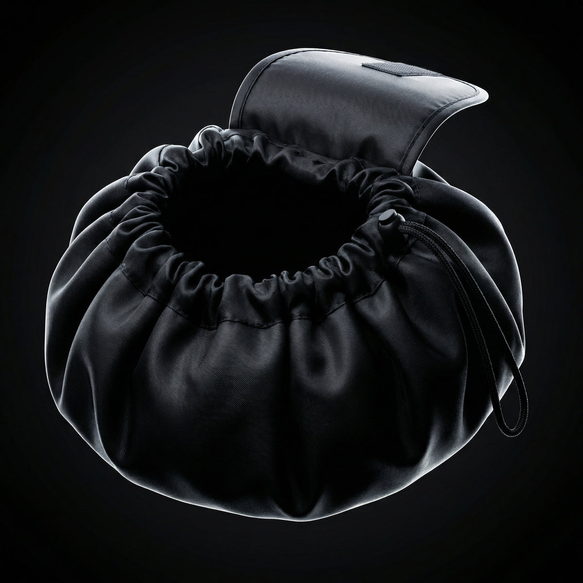 The closed Magic cosmetic case showing the drawstring, soft sides and top flap